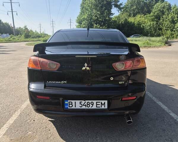Чорний Міцубісі Lancer, об'ємом двигуна 2 л та пробігом 243 тис. км за 6600 $, фото 13 на Automoto.ua