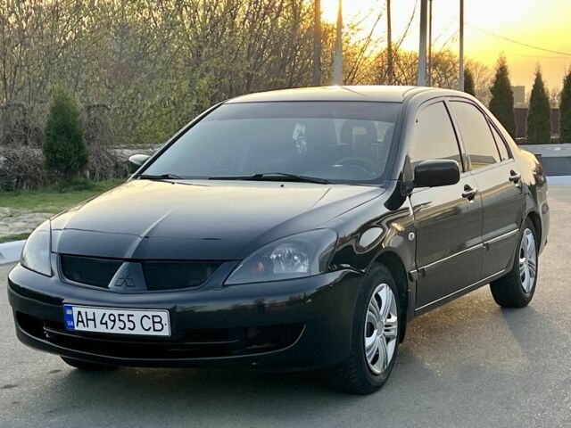 Чорний Міцубісі Lancer, об'ємом двигуна 0.16 л та пробігом 202 тис. км за 3900 $, фото 4 на Automoto.ua