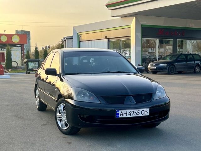 Чорний Міцубісі Lancer, об'ємом двигуна 0.16 л та пробігом 202 тис. км за 3900 $, фото 1 на Automoto.ua