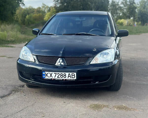 Мицубиси Лансер 2007 в Харькове на Automoto.ua Черный Мицубиси Лансер, объемом двигателя 1.58 л и пробегом 278 тыс. км за 3500 $, фото 2 на Automoto.ua