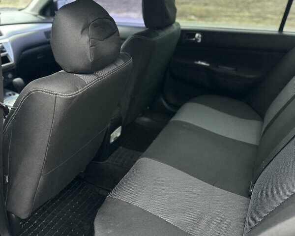 Черный Мицубиси Лансер, объемом двигателя 2 л и пробегом 260 тыс. км за 5300 $, фото 11 на Automoto.ua