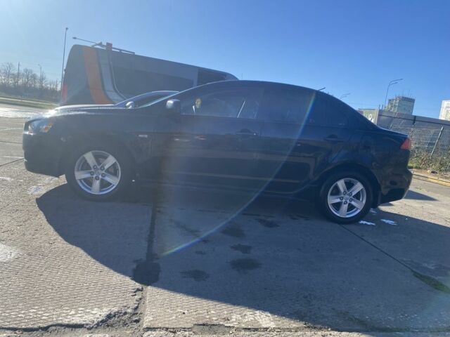 Черный Мицубиси Лансер, объемом двигателя 2 л и пробегом 372 тыс. км за 6200 $, фото 3 на Automoto.ua