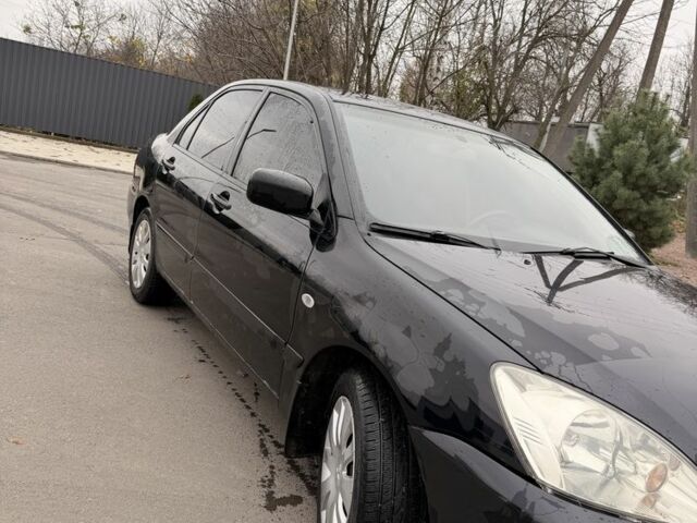 Черный Мицубиси Лансер, объемом двигателя 0 л и пробегом 240 тыс. км за 3300 $, фото 1 на Automoto.ua