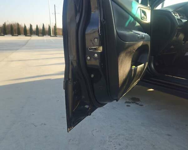 Чорний Міцубісі Lancer, об'ємом двигуна 1.59 л та пробігом 180 тис. км за 4999 $, фото 10 на Automoto.ua