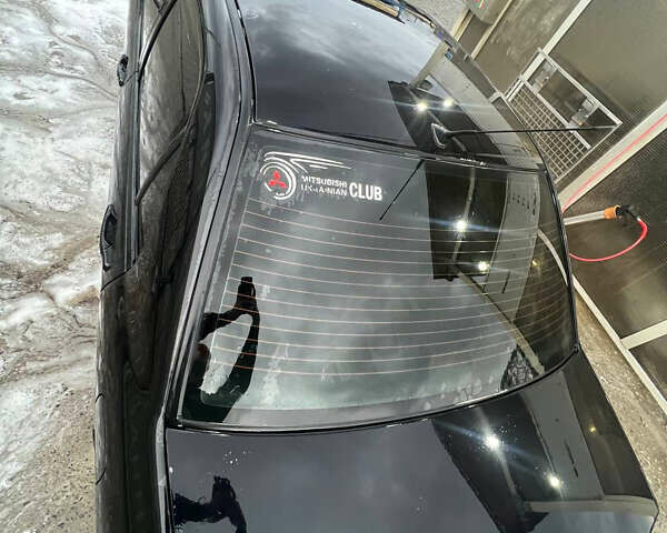 Черный Мицубиси Лансер, объемом двигателя 1.6 л и пробегом 180 тыс. км за 3499 $, фото 6 на Automoto.ua