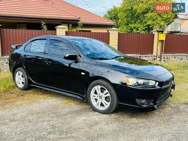 Чорний Міцубісі Lancer, об'ємом двигуна 2 л та пробігом 284 тис. км за 6200 $, фото 5 на Automoto.ua