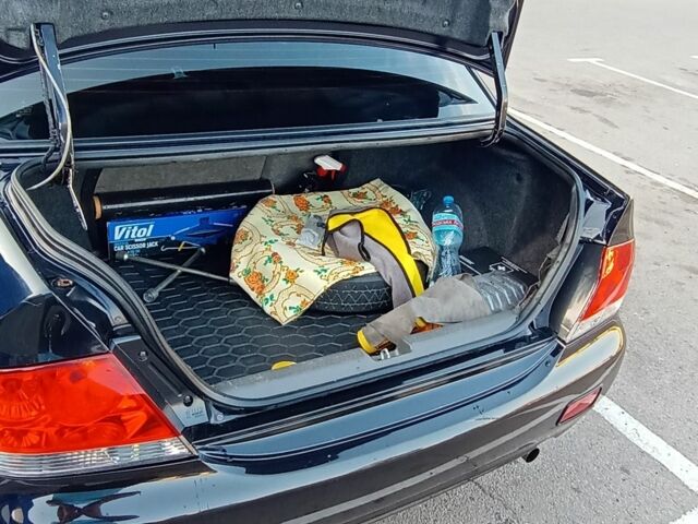 Черный Мицубиси Лансер, объемом двигателя 1.6 л и пробегом 301 тыс. км за 4300 $, фото 8 на Automoto.ua