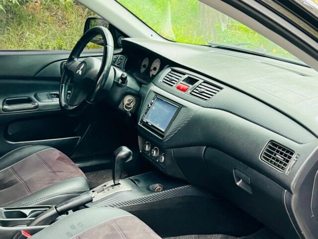 Чорний Міцубісі Lancer, об'ємом двигуна 1.6 л та пробігом 245 тис. км за 4700 $, фото 16 на Automoto.ua
