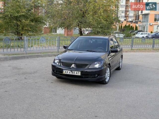 Чорний Міцубісі Lancer, об'ємом двигуна 2 л та пробігом 152 тис. км за 5500 $, фото 9 на Automoto.ua