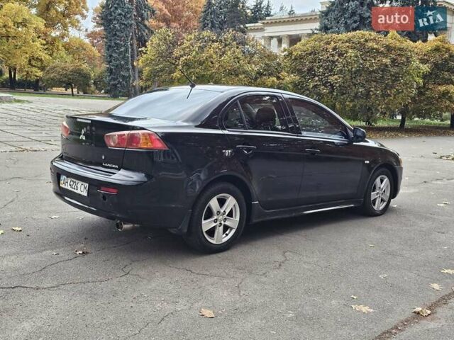 Міцубісі Lancer 2007 у Києві на Automoto.ua Чорний Міцубісі Lancer, об'ємом двигуна 2 л та пробігом 115 тис. км за 5000 $, фото 13 на Automoto.ua