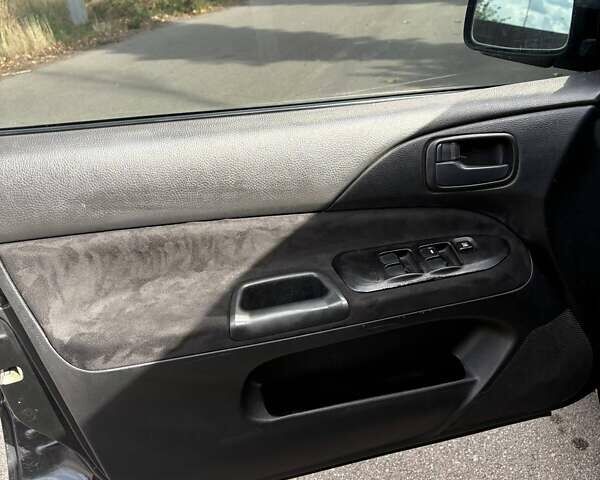 Черный Мицубиси Лансер, объемом двигателя 1.6 л и пробегом 244 тыс. км за 4100 $, фото 4 на Automoto.ua