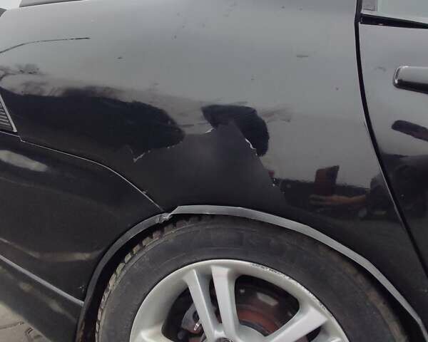 Чорний Міцубісі Lancer, об'ємом двигуна 2 л та пробігом 145 тис. км за 5000 $, фото 14 на Automoto.ua