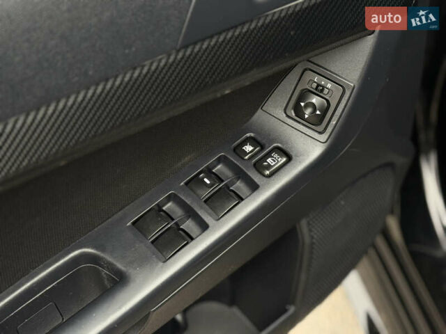 Чорний Міцубісі Lancer, об'ємом двигуна 2 л та пробігом 224 тис. км за 6500 $, фото 10 на Automoto.ua