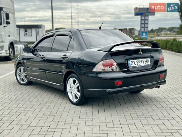 Чорний Міцубісі Lancer, об'ємом двигуна 2 л та пробігом 275 тис. км за 5300 $, фото 13 на Automoto.ua