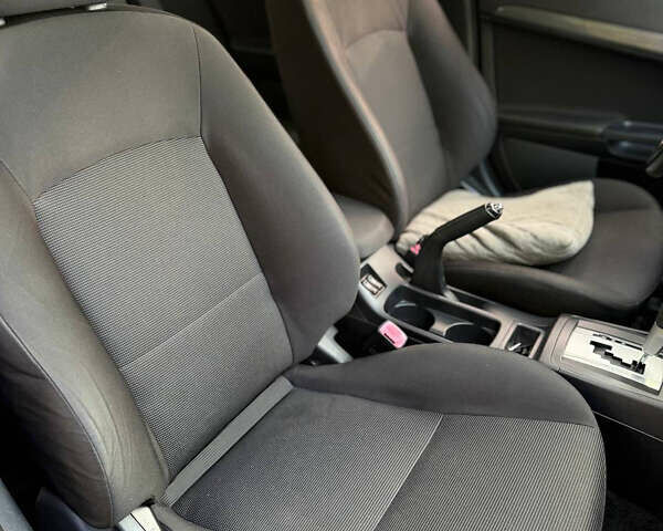 Черный Мицубиси Лансер, объемом двигателя 2 л и пробегом 219 тыс. км за 6400 $, фото 9 на Automoto.ua