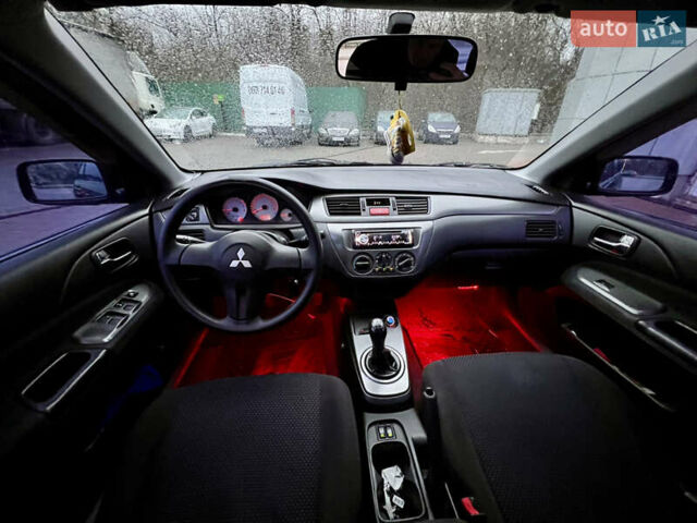 Чорний Міцубісі Lancer, об'ємом двигуна 1.6 л та пробігом 303 тис. км за 4350 $, фото 26 на Automoto.ua