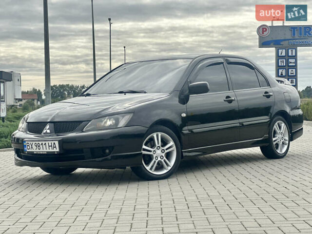 Чорний Міцубісі Lancer, об'ємом двигуна 2 л та пробігом 275 тис. км за 5300 $, фото 15 на Automoto.ua