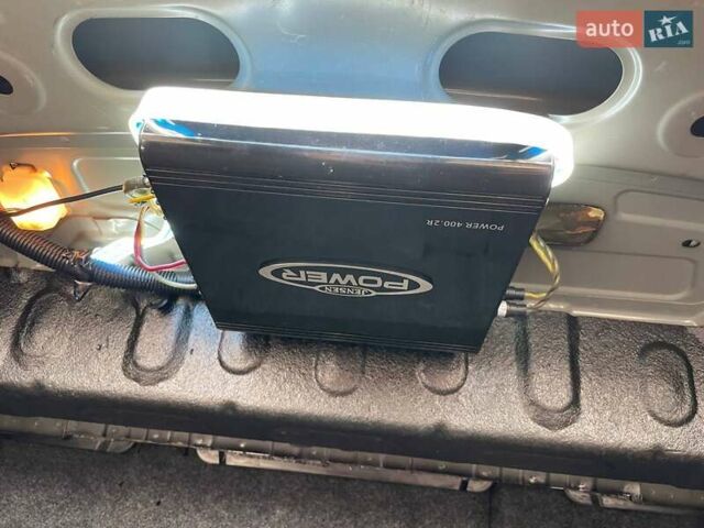 Черный Мицубиси Лансер, объемом двигателя 2 л и пробегом 246 тыс. км за 7500 $, фото 23 на Automoto.ua