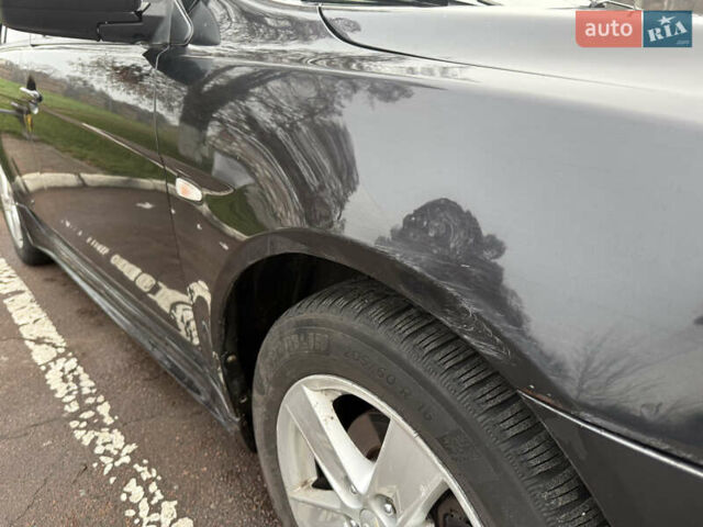 Чорний Міцубісі Lancer, об'ємом двигуна 2 л та пробігом 281 тис. км за 6000 $, фото 6 на Automoto.ua