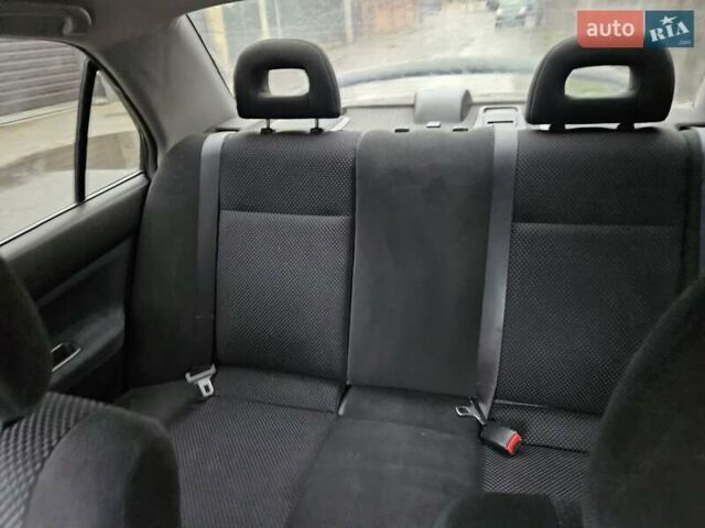 Черный Мицубиси Лансер, объемом двигателя 1.6 л и пробегом 152 тыс. км за 4999 $, фото 10 на Automoto.ua