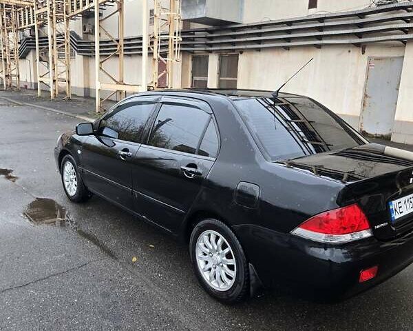 Мицубиси Лансер 2007 в Кривом Роге на Automoto.ua Черный Мицубиси Лансер, объемом двигателя 1.6 л и пробегом 200 тыс. км за 4900 $, фото 4 на Automoto.ua