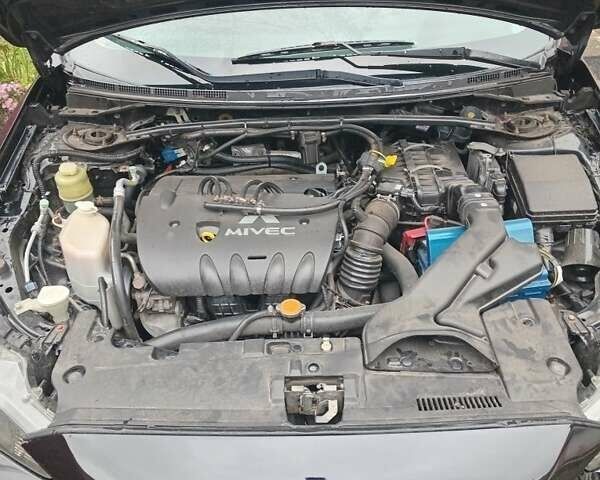 Чорний Міцубісі Lancer, об'ємом двигуна 2 л та пробігом 273 тис. км за 7100 $, фото 7 на Automoto.ua
