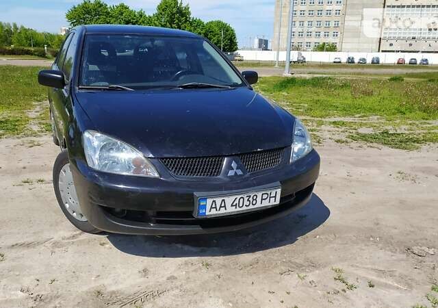 Чорний Міцубісі Lancer, об'ємом двигуна 1.6 л та пробігом 283 тис. км за 3999 $, фото 3 на Automoto.ua