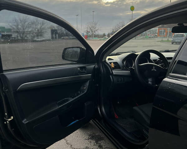 Чорний Міцубісі Lancer, об'ємом двигуна 1.5 л та пробігом 209 тис. км за 5500 $, фото 20 на Automoto.ua