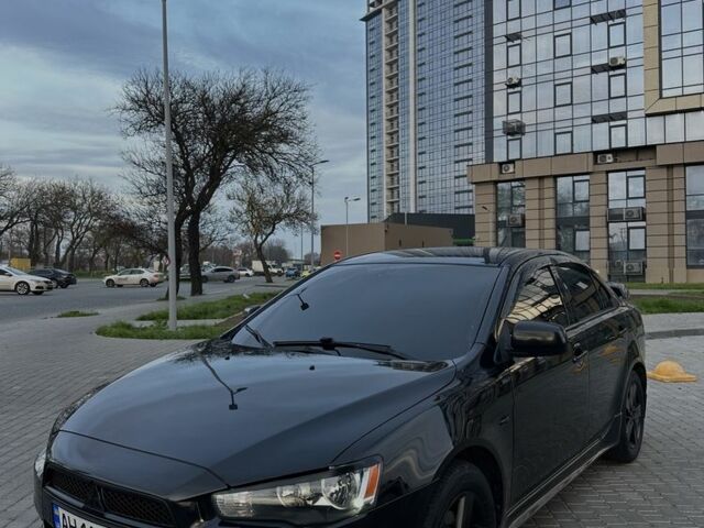 Черный Мицубиси Лансер, объемом двигателя 2 л и пробегом 242 тыс. км за 6200 $, фото 4 на Automoto.ua