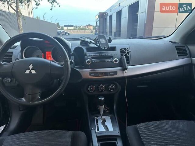 Чорний Міцубісі Lancer, об'ємом двигуна 1.5 л та пробігом 240 тис. км за 5800 $, фото 13 на Automoto.ua