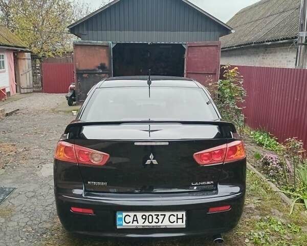 Чорний Міцубісі Lancer, об'ємом двигуна 2 л та пробігом 273 тис. км за 7100 $, фото 2 на Automoto.ua