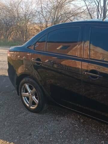 Черный Мицубиси Лансер, объемом двигателя 1.5 л и пробегом 270 тыс. км за 4999 $, фото 4 на Automoto.ua