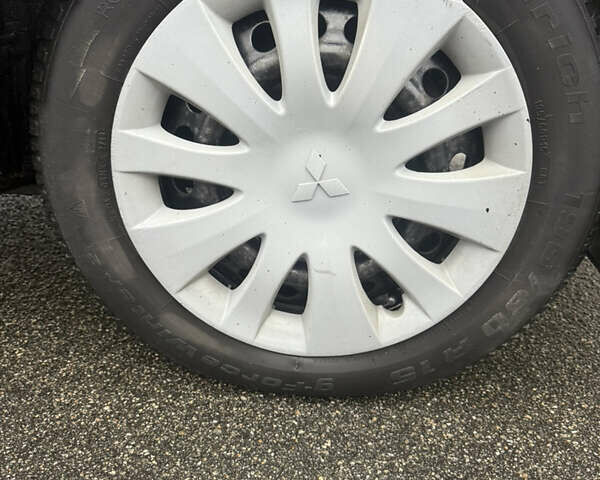 Чорний Міцубісі Lancer, об'ємом двигуна 1.58 л та пробігом 256 тис. км за 3700 $, фото 34 на Automoto.ua