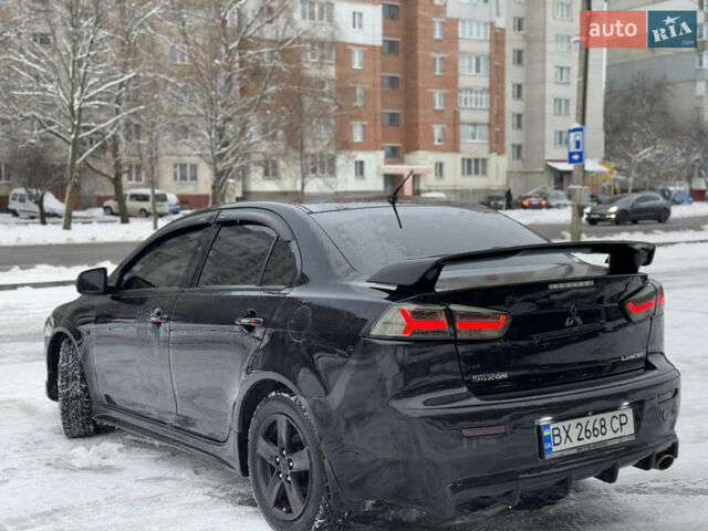 Черный Мицубиси Лансер, объемом двигателя 2 л и пробегом 215 тыс. км за 6600 $, фото 3 на Automoto.ua