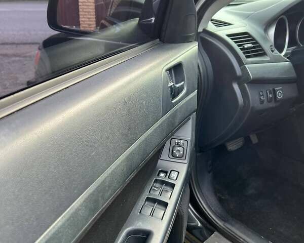 Чорний Міцубісі Lancer, об'ємом двигуна 2 л та пробігом 284 тис. км за 6200 $, фото 17 на Automoto.ua