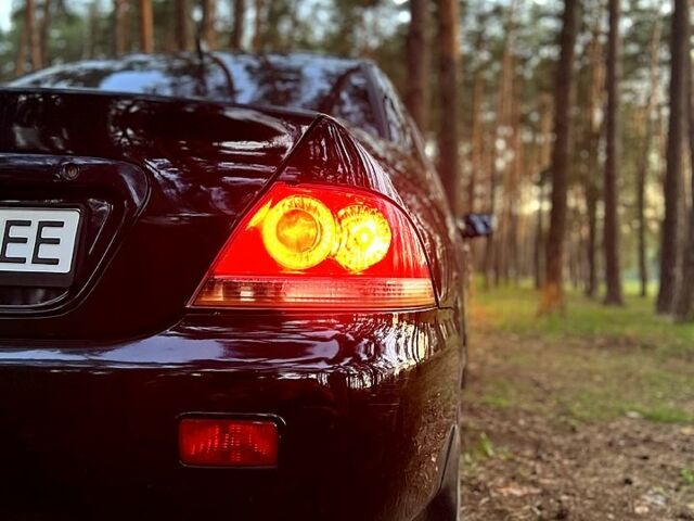Чорний Міцубісі Lancer, об'ємом двигуна 1.6 л та пробігом 224 тис. км за 4500 $, фото 2 на Automoto.ua