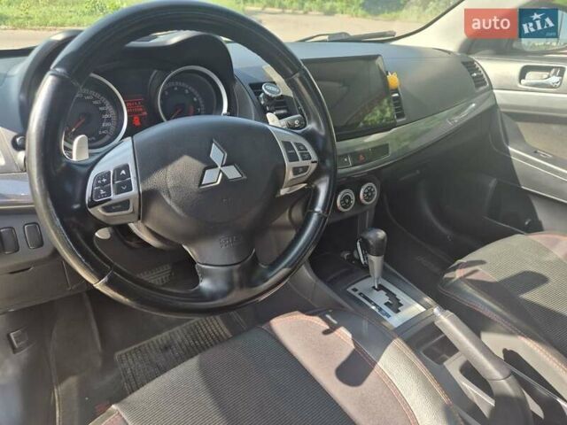 Чорний Міцубісі Lancer, об'ємом двигуна 2 л та пробігом 243 тис. км за 6600 $, фото 16 на Automoto.ua