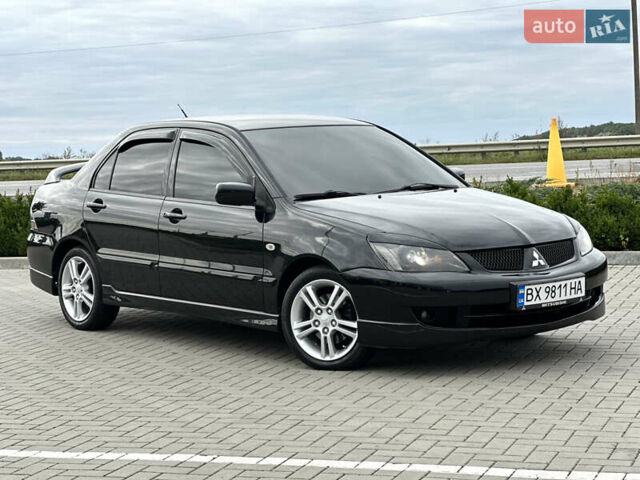 Чорний Міцубісі Lancer, об'ємом двигуна 2 л та пробігом 275 тис. км за 5300 $, фото 1 на Automoto.ua