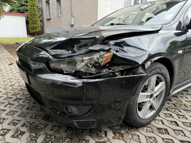 Чорний Міцубісі Lancer, об'ємом двигуна 2 л та пробігом 245 тис. км за 3500 $, фото 2 на Automoto.ua