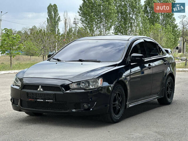 Чорний Міцубісі Lancer, об'ємом двигуна 2 л та пробігом 192 тис. км за 6500 $, фото 2 на Automoto.ua