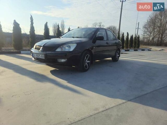Чорний Міцубісі Lancer, об'ємом двигуна 1.59 л та пробігом 180 тис. км за 4999 $, фото 2 на Automoto.ua