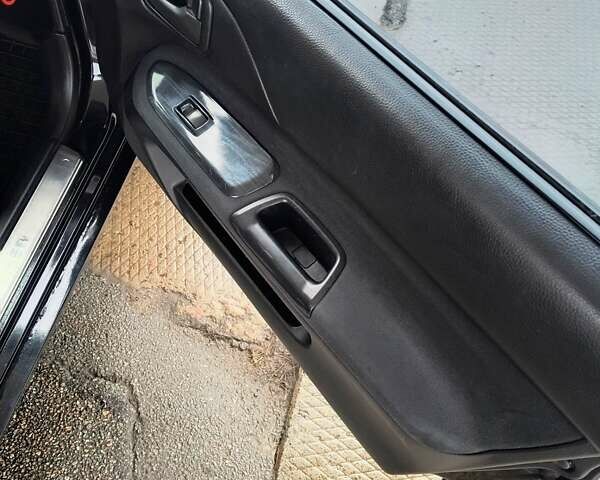 Черный Мицубиси Лансер, объемом двигателя 1.6 л и пробегом 309 тыс. км за 4000 $, фото 9 на Automoto.ua