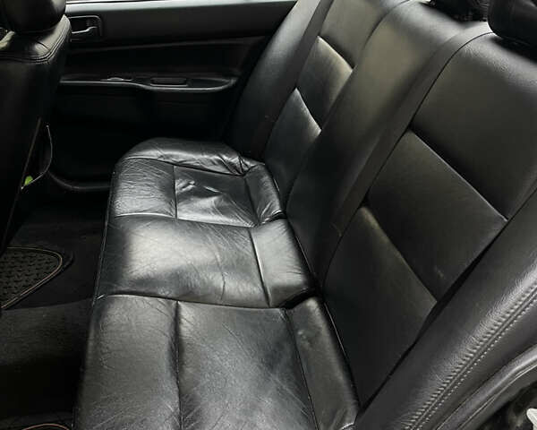 Чорний Міцубісі Lancer, об'ємом двигуна 1.6 л та пробігом 213 тис. км за 3000 $, фото 7 на Automoto.ua