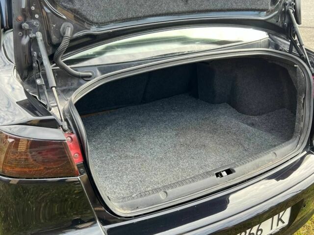 Чорний Міцубісі Lancer, об'ємом двигуна 2 л та пробігом 284 тис. км за 6200 $, фото 6 на Automoto.ua