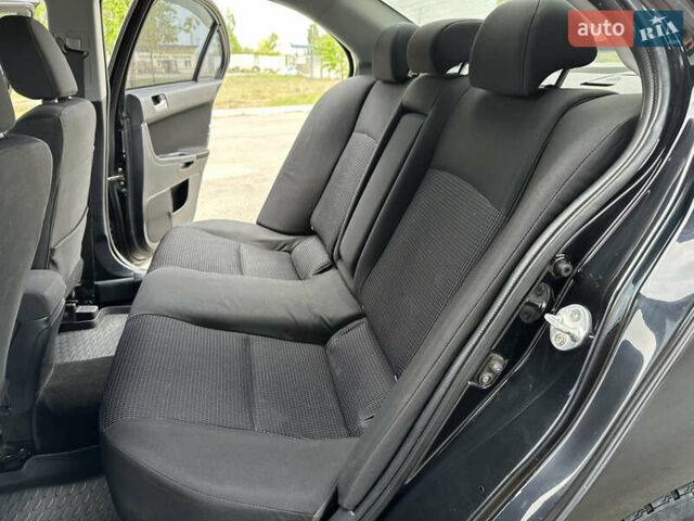 Чорний Міцубісі Lancer, об'ємом двигуна 2 л та пробігом 192 тис. км за 6500 $, фото 18 на Automoto.ua