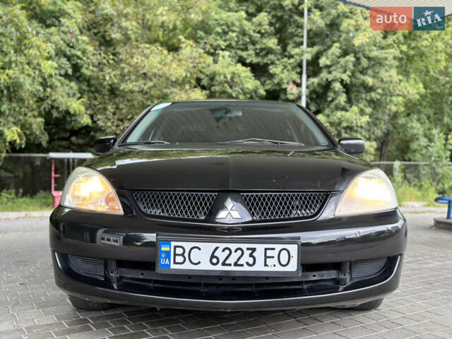 Чорний Міцубісі Lancer, об'ємом двигуна 1.6 л та пробігом 173 тис. км за 3700 $, фото 1 на Automoto.ua