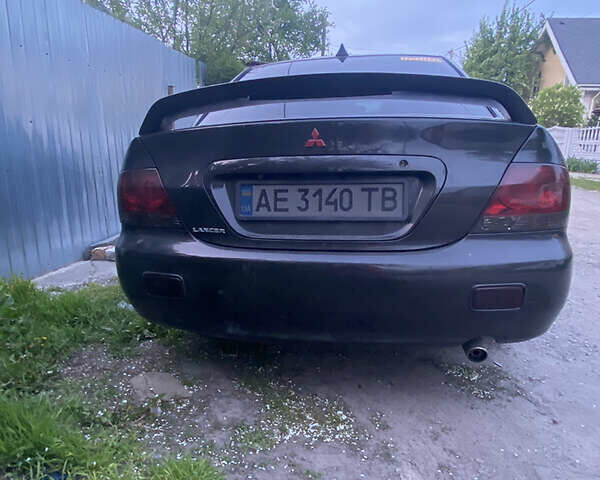 Чорний Міцубісі Lancer, об'ємом двигуна 1.6 л та пробігом 195 тис. км за 5200 $, фото 37 на Automoto.ua