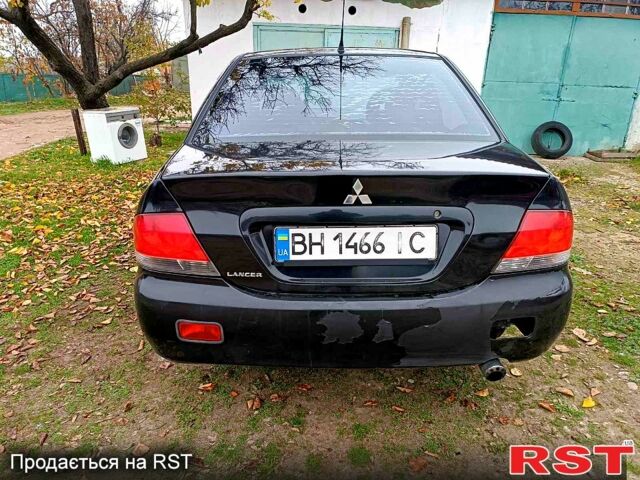 Чорний Міцубісі Lancer, об'ємом двигуна 1.6 л та пробігом 227 тис. км за 4100 $, фото 2 на Automoto.ua