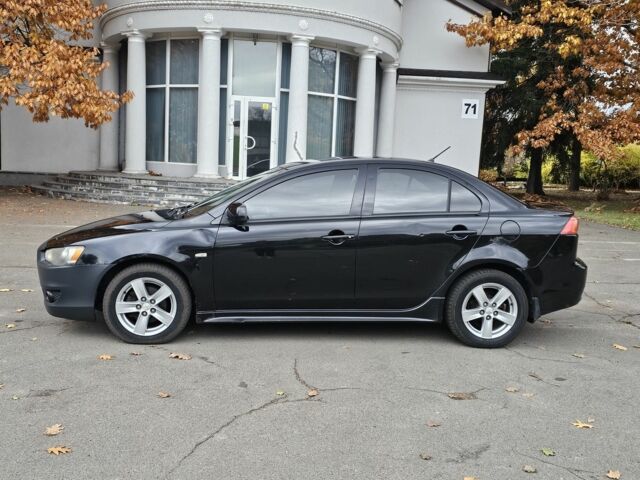 Черный Мицубиси Лансер, объемом двигателя 2 л и пробегом 115 тыс. км за 5000 $, фото 3 на Automoto.ua