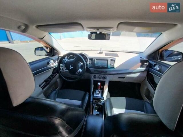 Чорний Міцубісі Lancer, об'ємом двигуна 2 л та пробігом 268 тис. км за 5000 $, фото 5 на Automoto.ua